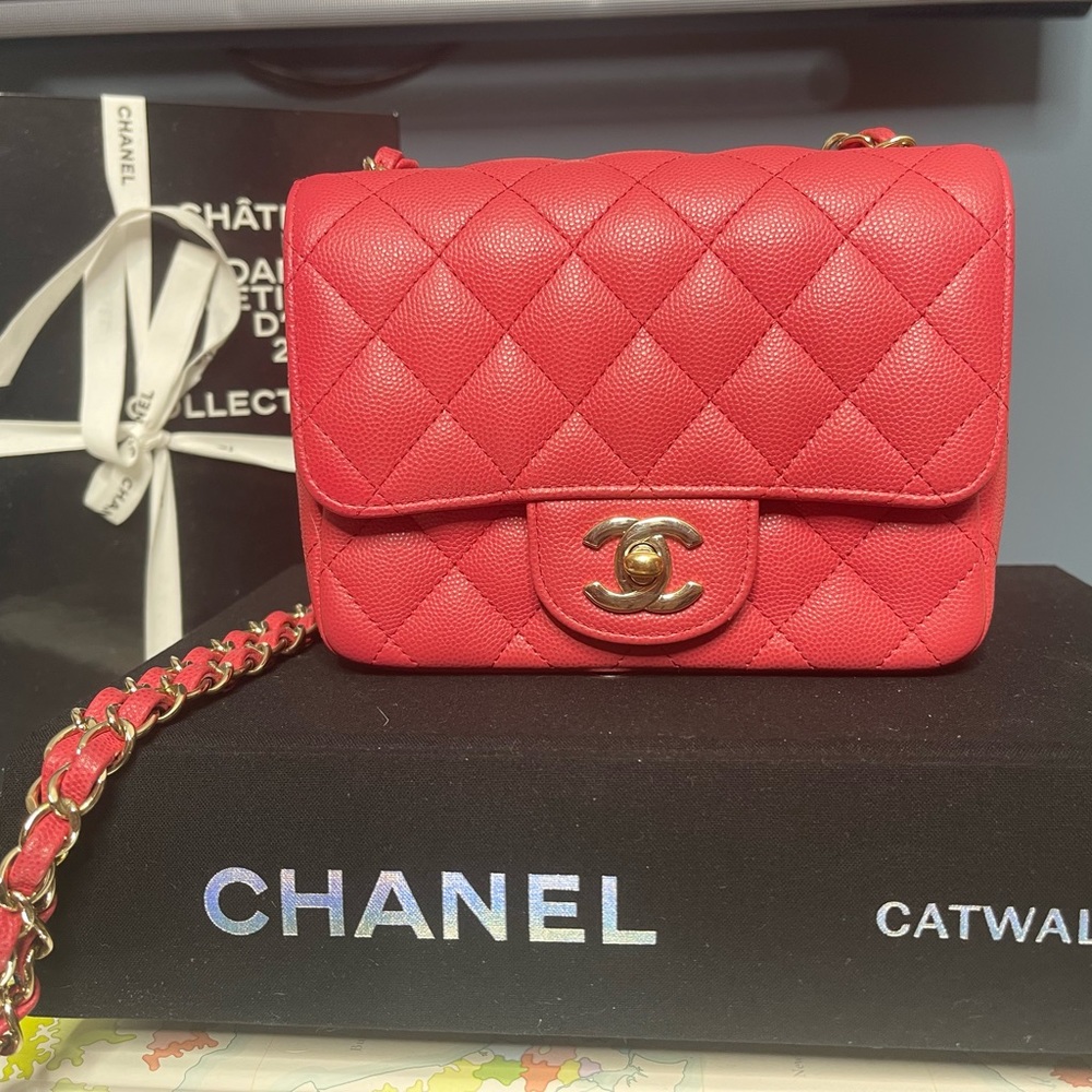 Chanel 17c Caviar Mini Square in Watermelon pink with gold hardware.
